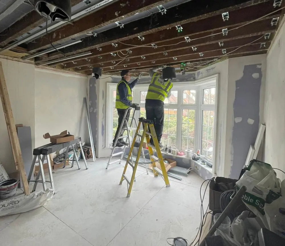 Home renovation North West London builders working on an open-plan kitchen